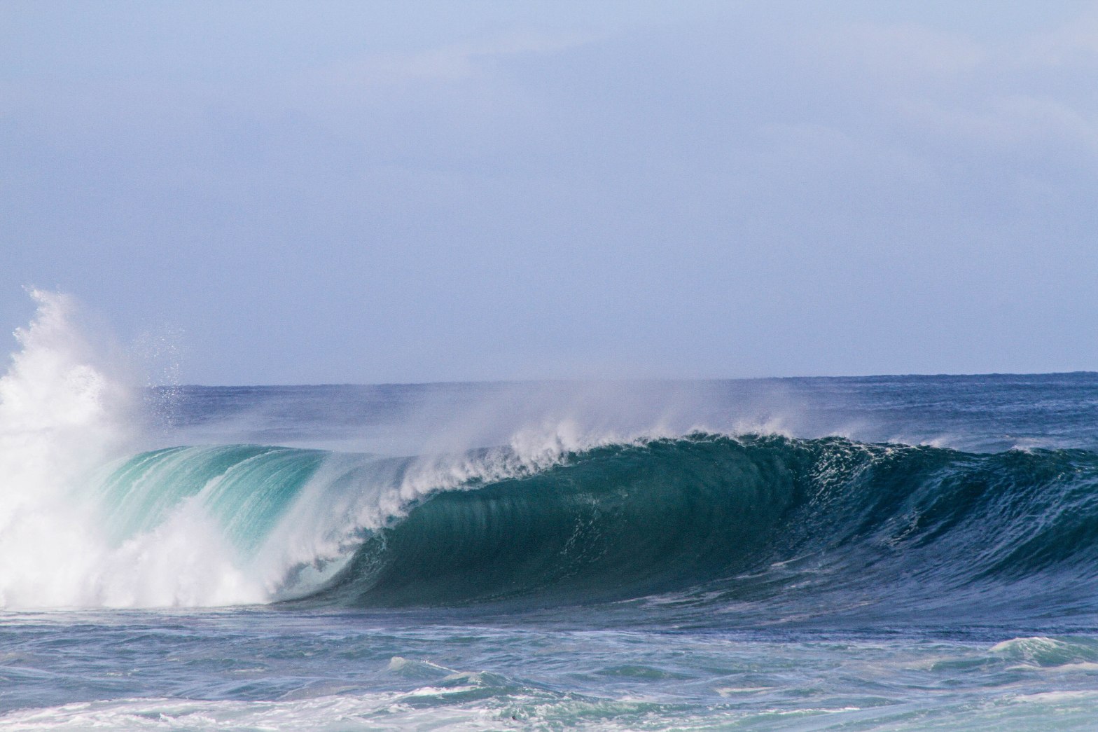 ocean waves creating sea spray (aerosol)